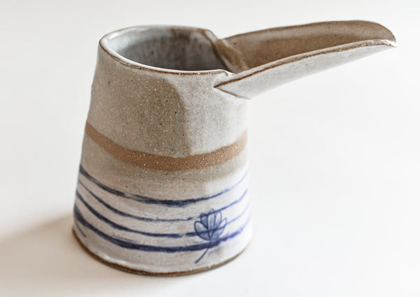 Blue and White Striped Stoneware Pitcher