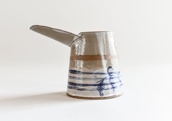 Blue and White Striped Stoneware Pitcher