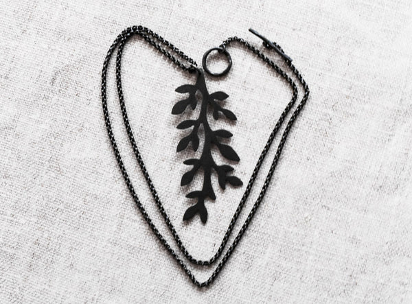 black leaves sterling silver pendant in heart shape
